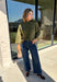 Bring a bold touch to your fall wardrobe with this cozy leopard sweater from Entro. Featuring a rich olive backdrop with a timeless leopard print, this effortlessly stylish knit is the perfect blend of classic and fun. The round neckline creates an easy, everyday silhouette, while the soft, cozy knit keeps you warm and comfortable on crisp autumn days. Whether you're headed to brunch, running errands, or enjoying a weekend getaway, this sweater is an easy favorite you'll wear on repeat.