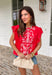 This red short sleeve top is the perfect pop of color for spring days ahead. Designed with neutral embroidery along the top, it brings just the right amount of contrast and charm. The lace sleeves add a soft, feminine touch, while the scalloped lace neckline gives it a beautifully detailed finish. Ladder trim detailing across the top adds texture and dimension, and the keyhole closure in the back completes the look with a subtle, polished detail. 