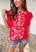 This red short sleeve top is the perfect pop of color for spring days ahead. Designed with neutral embroidery along the top, it brings just the right amount of contrast and charm. The lace sleeves add a soft, feminine touch, while the scalloped lace neckline gives it a beautifully detailed finish. Ladder trim detailing across the top adds texture and dimension, and the keyhole closure in the back completes the look with a subtle, polished detail. 
