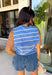 This light blue striped sweater tank with an attached scarf detail is such a chic, elevated piece for summer. The soft knit feel keeps it lightweight and breathable, while the built-in layered look adds that effortless, styled look without any extra effort. The white stripe print gives it a fresh, coastal vibe that’s perfect for everything from brunch to vacation dinners. It’s one of those pieces that instantly makes your outfit feel a little more put together. 