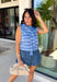 This light blue striped sweater tank with an attached scarf detail is such a chic, elevated piece for summer. The soft knit feel keeps it lightweight and breathable, while the built-in layered look adds that effortless, styled look without any extra effort. The white stripe print gives it a fresh, coastal vibe that’s perfect for everything from brunch to vacation dinners. It’s one of those pieces that instantly makes your outfit feel a little more put together. 