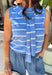 This light blue striped sweater tank with an attached scarf detail is such a chic, elevated piece for summer. The soft knit feel keeps it lightweight and breathable, while the built-in layered look adds that effortless, styled look without any extra effort. The white stripe print gives it a fresh, coastal vibe that’s perfect for everything from brunch to vacation dinners. It’s one of those pieces that instantly makes your outfit feel a little more put together. 