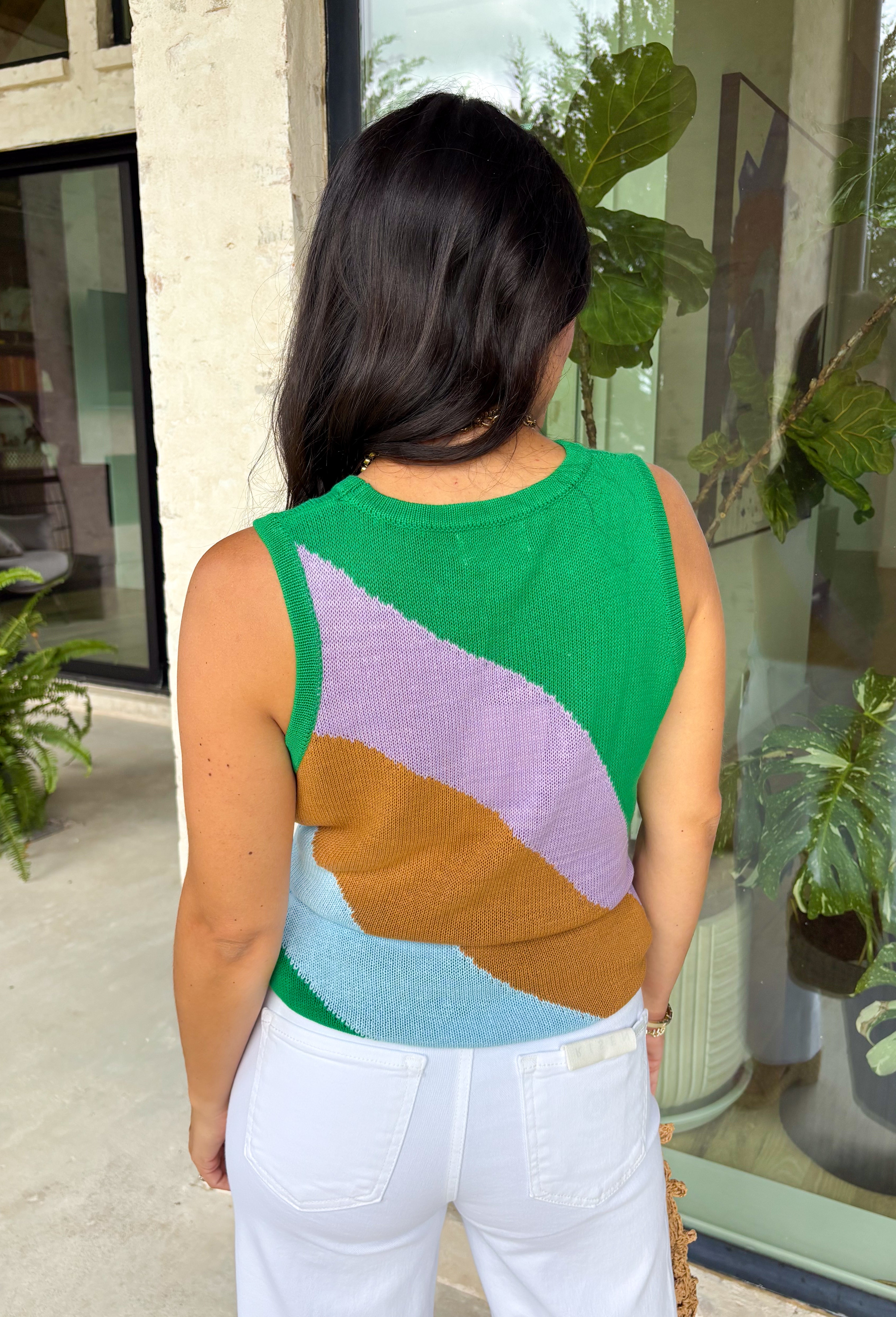 This lightweight knit sweater tank is the perfect mix of cozy and colorful for summer! Featuring a fun color block design in green, purple, brown, and light blue, it adds just the right pop while still feeling easy to style. The soft knit texture keeps it comfortable and breathable, making it great for warm days and cool evenings. It’s one of those effortless pieces that instantly makes your outfit feel styled—just pair it with denim or shorts and go. 