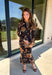 Effortlessly elegant and endlessly versatile, this matching set from Hyfve is a standout for the season. Featuring a black backdrop with a beautiful neutral floral print in muted shades of orange and olive, this two-piece outfit offers a timeless look you'll love wearing together or mixing and matching with other favorites in your wardrobe.