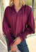 Bring a touch of romantic charm to your fall wardrobe with this beautifully detailed blouse from Entro. Designed in a rich burgundy hue, this feminine top features a softly smocked neckline with a delicate front tie for an effortlessly graceful look. The long sleeves are finished with smocked cuffs and lace trim, while the lace hem adds an elegant finishing touch. 