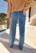 These jeans are here to make a statement. With their super high waist, tie waistband, and sweeping full-length wide leg, they give off major vintage-inspired vibes while keeping things modern and flattering. The medium wash makes them endlessly versatile, and the 34" inseam means they pair beautifully with heels, wedges, or platforms. Soft with a hint of stretch, they’re the perfect mix of structured and comfortable—ready to elevate your fall denim lineup.
