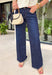 A pair of dark wash jeans is a wardrobe essential, and this style checks all the boxes! The rich dark wash gives these jeans a polished, elevated look, while the wide leg silhouette keeps them effortlessly on trend. Designed with a comfortable mid-rise fit and just the right amount of stretch, they're perfect for everything from workdays to weekend plans. Easy to dress up or down, these versatile jeans pair beautifully with cozy sweaters, tailored blouses, graphic tees, and everything in between. 