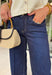 A pair of dark wash jeans is a wardrobe essential, and this style checks all the boxes! The rich dark wash gives these jeans a polished, elevated look, while the wide leg silhouette keeps them effortlessly on trend. Designed with a comfortable mid-rise fit and just the right amount of stretch, they're perfect for everything from workdays to weekend plans. Easy to dress up or down, these versatile jeans pair beautifully with cozy sweaters, tailored blouses, graphic tees, and everything in between. 