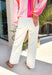 A classic pair of white wide leg jeans is a summer must—and this pair does it perfectly! Designed with a flattering wide leg silhouette and a clean, timeless look, these jeans are easy to style for anything on your calendar. The structured fit with a hint of stretch keeps them comfortable while still looking polished. Whether you’re pairing them with a bright top, a breezy blouse, or a simple tank, they instantly pull your outfit together. 