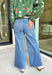 Your new go-to denim for effortless style—these medium wash wide leg jeans are designed with comfort and versatility in mind. Crafted with a soft tencel blend and a hint of stretch, they move with you while keeping their shape. The cropped 26" inseam makes them perfect for showing off boots, sneakers, or heels, giving them endless styling potential for the season.