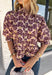 Soft, feminine, and full of seasonal charm, this floral blouse is an effortless addition to your fall wardrobe. Designed with a beautiful blush backdrop and a rich burgundy and tan floral print, this top brings together warm autumn hues in a timeless silhouette. The button-front design adds classic appeal, while the ruffle hem creates a flattering, feminine finish. Gathered detailing at the back yoke gives this blouse a relaxed, flowy fit that's perfect for everything from workdays to weekend outings.
