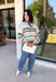 Brighten up chilly days with this irresistibly cozy sweater from Hyfve. Featuring a beautiful stripe pattern in sea foam, light pink, green, tan, and burgundy, this soft knit brings the perfect mix of playful color and timeless fall style. The mock neckline adds a cozy touch for cooler weather, while the ribbed neckline, cuffs, and hem create a polished finish. 