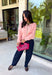 Bright colors come together beautifully in this cozy striped cardigan! Featuring pink and salmon stripes accented with an olive trim, this timeless knit adds the perfect pop of seasonal color to any outfit. The button-down front offers endless styling options, while the ribbed neckline gives it a classic finish. Soft, lightweight, and easy to layer, this cardigan is perfect for everything from office days and coffee dates to football weekends and crisp autumn afternoons.