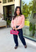 Bright colors come together beautifully in this cozy striped cardigan! Featuring pink and salmon stripes accented with an olive trim, this timeless knit adds the perfect pop of seasonal color to any outfit. The button-down front offers endless styling options, while the ribbed neckline gives it a classic finish. Soft, lightweight, and easy to layer, this cardigan is perfect for everything from office days and coffee dates to football weekends and crisp autumn afternoons.
