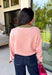 Bright colors come together beautifully in this cozy striped cardigan! Featuring pink and salmon stripes accented with an olive trim, this timeless knit adds the perfect pop of seasonal color to any outfit. The button-down front offers endless styling options, while the ribbed neckline gives it a classic finish. Soft, lightweight, and easy to layer, this cardigan is perfect for everything from office days and coffee dates to football weekends and crisp autumn afternoons.