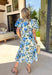 Soft, flowy, and full of spring romance, this off-white midi dress by Entro is an instant favorite. Featuring a beautiful green and blue floral print, it feels fresh and easy while still making a statement. The ruffled neckline and short puff sleeves add a sweet, feminine touch, while the button-front design keeps it classic and effortless. 