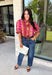 Bring playful pattern and timeless charm to your fall wardrobe with this beautifully detailed top from Entro. Featuring a unique mix of stripe and polka dot prints in rich shades of plum, magenta, and olive, this eye-catching blouse is perfect for adding personality to your everyday style. The feminine ruffle neckline and button-front design create a polished look, while the short puff sleeves are finished with smocked ruffle cuffs for an extra touch of charm. 