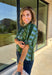 Bring playful pattern and timeless charm to your fall wardrobe with this beautifully detailed top from Entro. Featuring a unique mix of stripe and polka dot prints in rich shades of olive and blue, this eye-catching blouse is perfect for adding personality to your everyday style. The feminine ruffle neckline and button-front design create a polished look, while the short puff sleeves are finished with smocked ruffle cuffs for an extra touch of charm. 