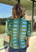 Bring playful pattern and timeless charm to your fall wardrobe with this beautifully detailed top from Entro. Featuring a unique mix of stripe and polka dot prints in rich shades of olive and blue, this eye-catching blouse is perfect for adding personality to your everyday style. The feminine ruffle neckline and button-front design create a polished look, while the short puff sleeves are finished with smocked ruffle cuffs for an extra touch of charm. 
