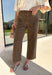 These wide leg pants from Entro are the perfect way to add a little personality to your everyday wardrobe. Designed in a rich brown denim with a classic white polka dot print, they offer a fun yet timeless look that's easy to style all season long. The flattering wide leg silhouette creates an effortlessly elevated feel, while the sturdy cotton denim and functional pockets make them as practical as they are stylish. 