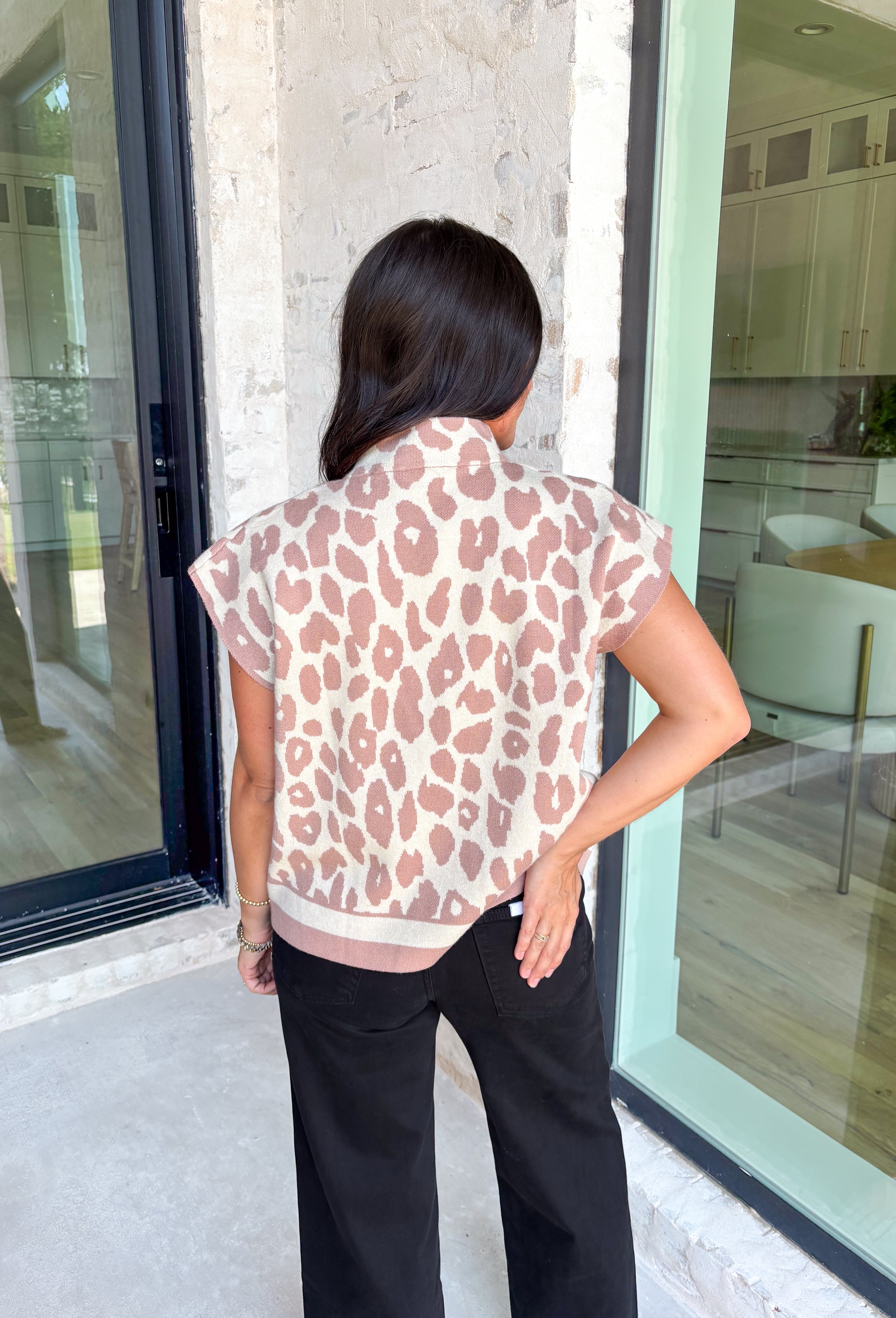 Elevated and cozy with a touch of wild, this neutral leopard sweater is the perfect statement knit for fall. The mock neck adds a modern, polished feel, while the short sleeves make it a versatile piece for layering or wearing solo during transitional weather. Crafted from a soft, stretchy blend, it’s as comfortable as it is chic—easy to pair with everything from jeans to skirts for an instant outfit upgrade.