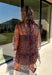 Turn up the print with this leopard dress from Entro, made for days when your outfit deserves a little extra personality. The classic leopard pattern pairs with a mock neckline for a put-together look, while the self-tie detail at the back adds a pretty finishing touch. Long balloon sleeves create soft volume and are finished with elastic cuffs for a comfortable fit. A playful ruffle hem adds movement to the shorter silhouette, and the lined design provides coverage beneath the semi-sheer woven fabric.