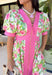 Fresh, flattering, and made for spring days, this off-white midi dress is an easy standout. Featuring a green and pink floral print throughout, it feels bright and cheerful, while the pink trim adds the sweetest pop of contrast. The front zipper closure gives it a modern touch, and the front slit makes it easy to move (and adds a little extra flair). 