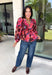 Rich autumn color and pretty details come together in this floral blouse from Entro. The warm brown background is covered in a fall-inspired floral print, making it an easy way to bring the colors of the season into your everyday wardrobe. A v-neckline and button-front closure keep the silhouette classic, while scalloped trim along the neckline and sleeve cuffs adds a sweet finishing touch. 