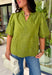 Classic details and rich autumn color come together beautifully in this effortlessly feminine blouse. Designed in a gorgeous olive green hue, this top features delicate embroidery that adds texture and timeless charm without overwhelming the look. The split neckline and puff sleeves create an elevated silhouette, while the scalloped trim along the hem and sleeve openings adds a sweet finishing touch. 