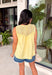 A little texture goes a long way! This sleeveless butter yellow top by Fate combines soft cotton with airy mesh and delicate appliqué details for a unique, elevated twist on a classic top. Lightweight, breathable, and endlessly versatile, it’s the perfect piece to dress up or down, making it a year-round favorite.