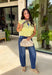 Say hello to your new sunshine staple! This butter yellow short sleeve top is giving all the happy, fresh vibes with its tiered peplum silhouette and delicate shirred detailing throughout. The lightweight, textured cotton keeps it breathable and easy to wear, while the cropped length and elastic hem create a flattering shape that pairs perfectly with high-rise denim. It’s playful, feminine, and made for warm days when you want something effortless but still extra cute.