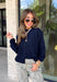 Wrap yourself in cozy comfort with this timeless button-down cardigan from W. Studio. Designed in a rich navy hue, this ultra-soft knit is the perfect layering piece for crisp fall days and cozy evenings. The classic button-front design makes it easy to wear open over your favorite basics or buttoned up as a sweater, while the plush knit blend offers warmth without feeling bulky. 