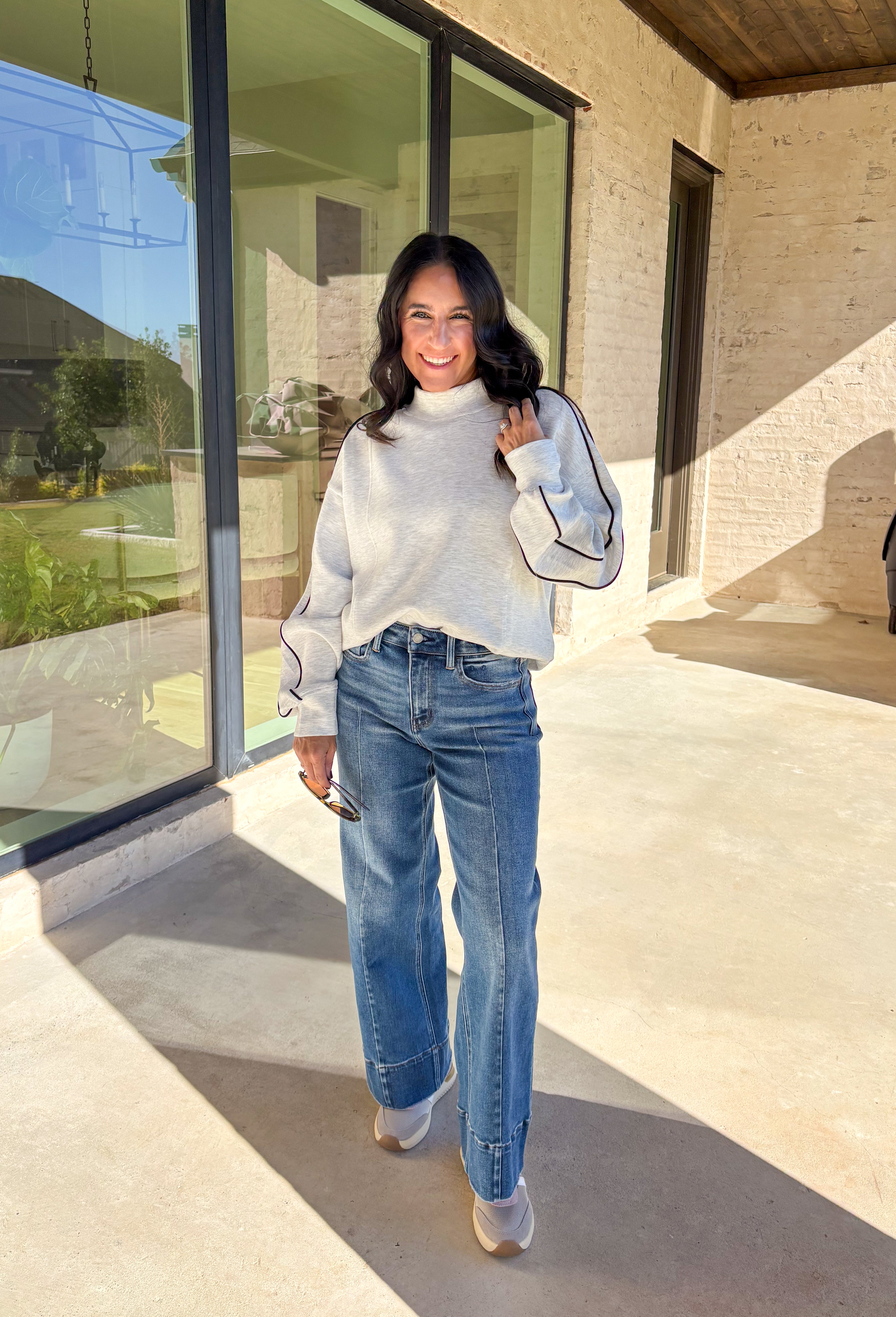 Everyone’s favorite denim just got a fresh update! These medium wash wide leg jeans feature stylish front seams running down both legs for an elongating effect. Made by Vervet with a soft yet structured cotton blend, these jeans offer just enough stretch for all-day comfort. Dress them up with heels or keep it casual with sneakers—either way, you’ll love their effortlessly cool vibe.