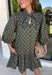 Unexpected color makes this floral dress from Entro such a fun pick for the season. The olive green background is covered in an abstract periwinkle floral print, creating a pretty mix of earthy and cool tones that stands out from traditional fall florals. A shirt collar and self-tie neckline add extra detail, while the button-front closure and ¾ puff sleeves give the silhouette a classic feel. The ruffle hem adds a playful finish, and the lined design provides comfortable coverage.
