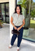 Bring a fresh pop of hunter green into your fall lineup with this striped top from Day + Moon. The cream and hunter green color combination feels classic for the season, while the front zipper detail gives it a sporty, modern touch. Elastic at the sleeves and hem creates an easy, comfortable shape that's perfect for busy days when you still want to feel put together. From football Saturdays and coffee runs to casual dinners and everyday errands, this top is an easy pick to wear with denim all season long.