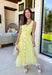 Bold, polished, and beautifully detailed — this lemon yellow eyelet lace midi dress is a true standout. The intricate eyelet lace gives it texture and dimension, while the gold textured button-down front adds a hint of shine that elevates the entire look. Designed with a matching belt featuring a gold buckle, this dress cinches the waist for a flattering, feminine silhouette. Smocking along the back provides comfortable stretch, and the back zipper closure keeps the fit secure and streamlined. 