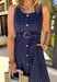 Bold, polished, and beautifully detailed — this navy eyelet lace midi dress is a true standout. The intricate eyelet lace gives it texture and dimension, while the gold textured button-down front adds a hint of shine that elevates the entire look. Designed with a matching belt featuring a gold buckle, this dress cinches the waist for a flattering, feminine silhouette. Smocking along the back provides comfortable stretch, and the back zipper closure keeps the fit secure and streamlined.