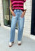 Meet the denim you'll be reaching for on repeat. These light wash barrel jeans combine a modern silhouette with everyday comfort, making them an easy staple for every season. Designed with a flattering high-rise fit and an on-trend cropped barrel leg, they offer a relaxed yet polished look that pairs effortlessly with everything from cozy sweaters to your favorite graphic tees. The innovative hidden adjustable waistband provides a customizable fit you'll appreciate.