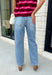 Meet the denim you'll be reaching for on repeat. These light wash barrel jeans combine a modern silhouette with everyday comfort, making them an easy staple for every season. Designed with a flattering high-rise fit and an on-trend cropped barrel leg, they offer a relaxed yet polished look that pairs effortlessly with everything from cozy sweaters to your favorite graphic tees. The innovative hidden adjustable waistband provides a customizable fit you'll appreciate.