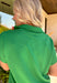 Fresh, sporty, and effortlessly polished, this green zip-front pullover by Umgee is the perfect lightweight layer for spring days. The crisp contrast accents of cream, navy, and light blue add a clean pop, while the zip-front detail gives you adjustable styling—wear it zipped up for a sleek look or slightly open for a more relaxed vibe. You'll find yourself reaching for this top all season long!