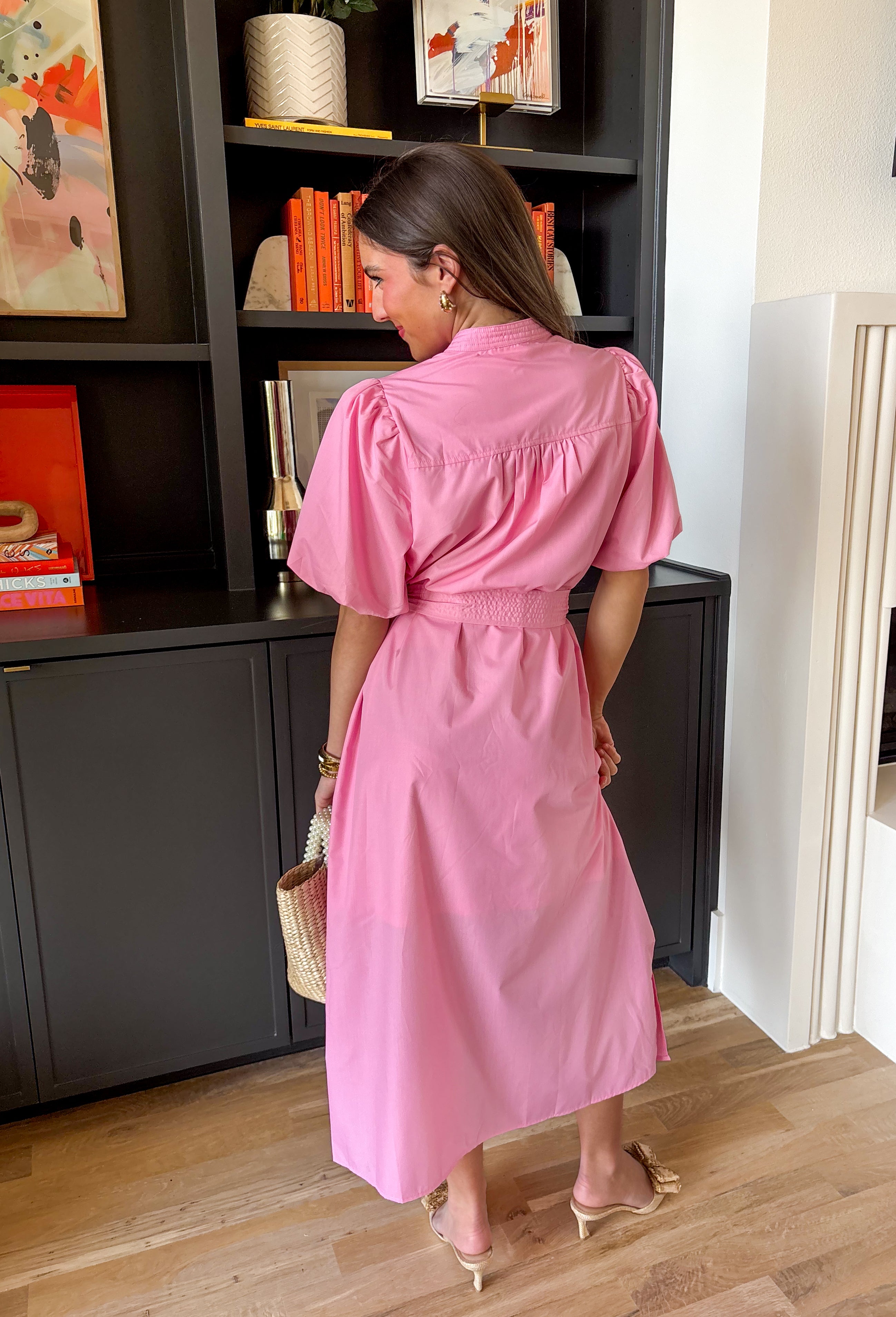 Easy, breezy, and made for sunny spring days, this light pink short sleeve midi dress by Entro is the kind of throw-on-and-go piece you’ll reach for nonstop. The puff sleeves add a sweet, feminine touch, while the matching self-tie belt lets you cinch the waist for a flattering fit. Lightweight and comfy, it’s perfect for everything from weekend plans to special occasions, you'll constantly find yourself reaching for this!