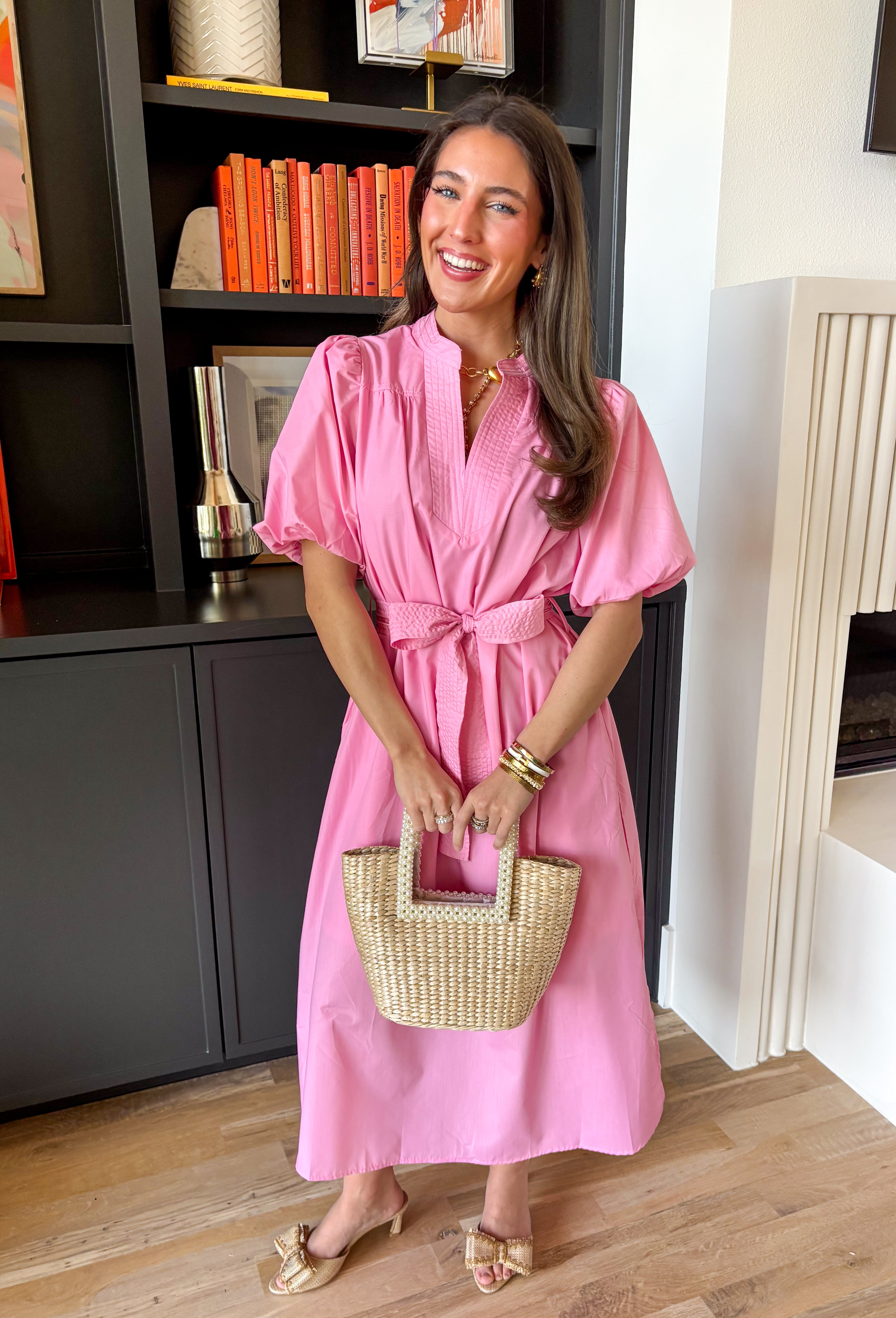 Easy, breezy, and made for sunny spring days, this light pink short sleeve midi dress by Entro is the kind of throw-on-and-go piece you’ll reach for nonstop. The puff sleeves add a sweet, feminine touch, while the matching self-tie belt lets you cinch the waist for a flattering fit. Lightweight and comfy, it’s perfect for everything from weekend plans to special occasions, you'll constantly find yourself reaching for this!