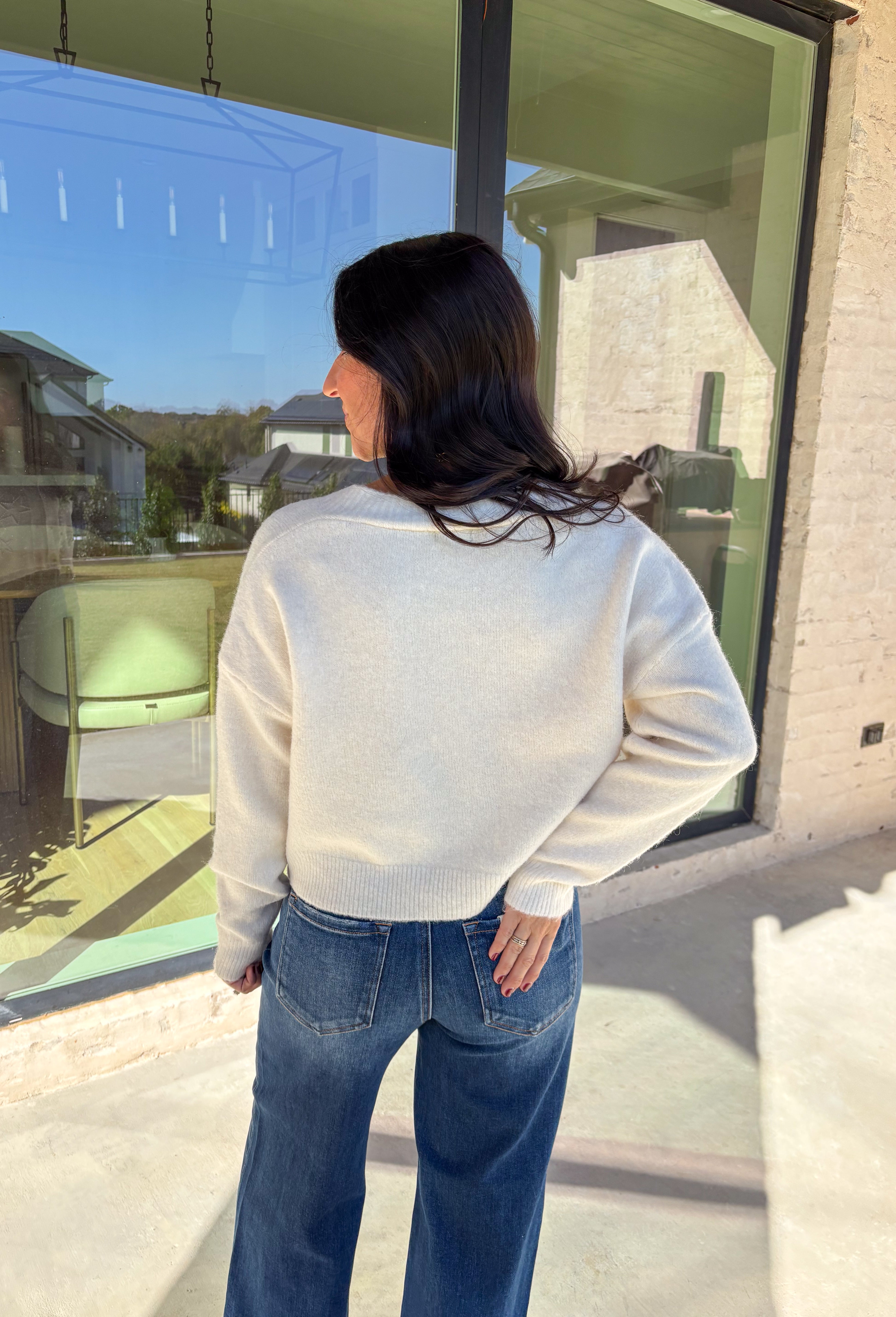 Shine bright this season in this off-white button-down cardigan by Debut. Crafted from a soft, cozy knit, this sweater features delicate pearl star embellishments that add the perfect hint of glam. With its relaxed fit and timeless charm, it’s a dreamy layer for holiday gatherings or casual winter days.