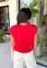Say hello to your new fall favorite! This rich red short sleeve top brings all the cozy seasonal charm with its tiered peplum silhouette and delicate shirred detailing throughout. The lightweight, textured cotton makes it comfortable enough for those warmer autumn afternoons, while the cropped length and elastic hem create a flattering shape that pairs perfectly with your favorite high-rise denim. 