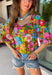 This green floral top is bursting with color and made for sunny summer days! Featuring a vibrant floral print in shades of pink, red, yellow, and blue, it instantly brightens up any outfit. The square neckline gives it a flattering, feminine feel, while the puff sleeves add just the right amount of charm. Finished with a sweet tie detail in the back, this lightweight cotton top is perfect for everything from brunch dates to weekend getaways. 
