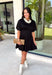 Every wardrobe deserves a little black dress that's as comfortable as it is stylish! This timeless dress is designed with flattering pintuck detailing at the waist to create an effortlessly polished silhouette you'll love. The soft knit fabric offers all-day comfort, while the classic round neckline and side pockets make it an easy choice for everything from workdays to dinner dates and weekend outings. 