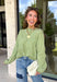 Nothing says cozy season quite like the perfect everyday sweater, and this one from Things Between is sure to become your new favorite. Designed in a matcha hue, this soft knit sweater is effortlessly timeless and easy to style with all your favorite fall pieces. The cozy knit construction offers warmth without feeling bulky, making it perfect for layering on crisp mornings or wearing on its own throughout the season. 