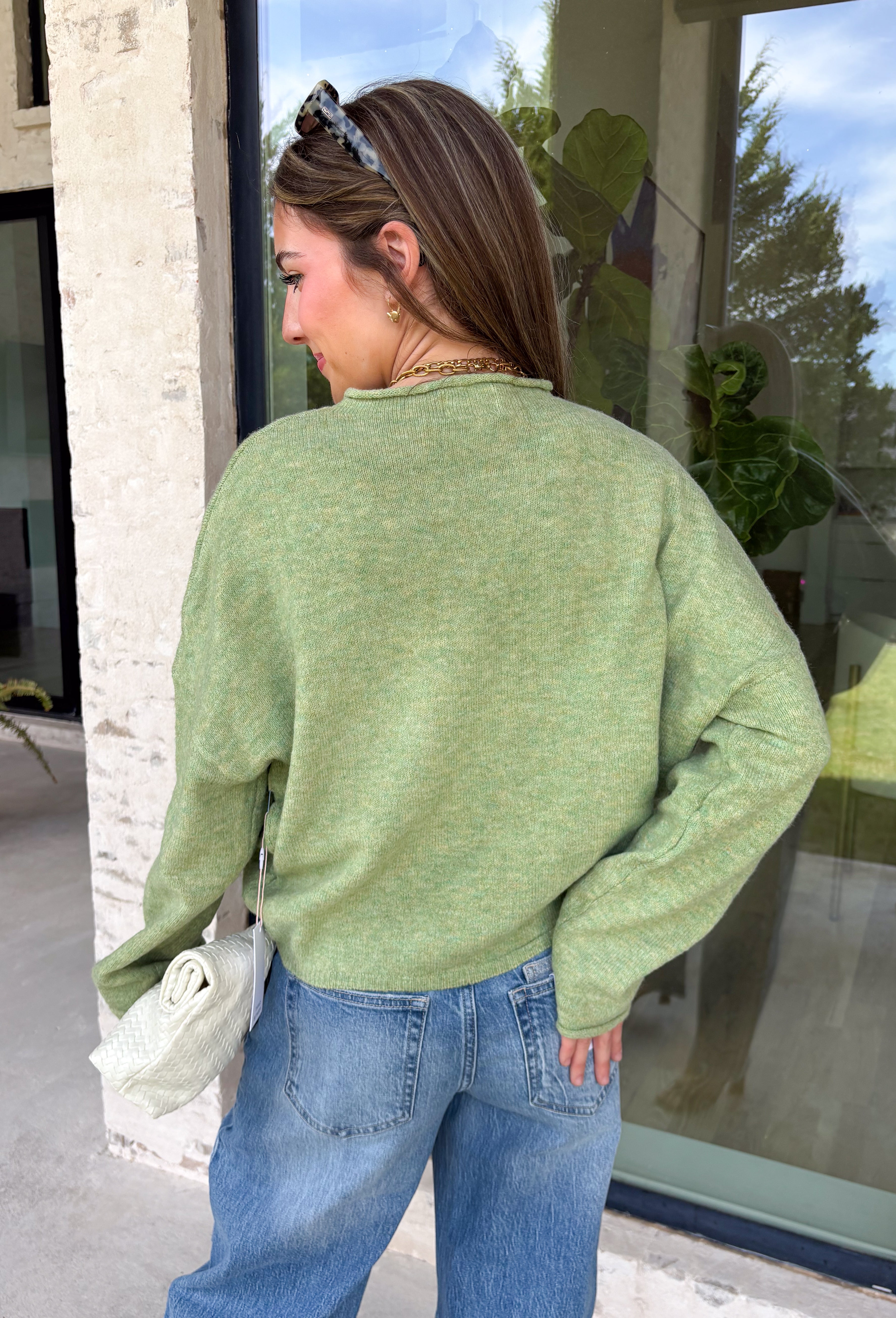 Nothing says cozy season quite like the perfect everyday sweater, and this one from Things Between is sure to become your new favorite. Designed in a matcha hue, this soft knit sweater is effortlessly timeless and easy to style with all your favorite fall pieces. The cozy knit construction offers warmth without feeling bulky, making it perfect for layering on crisp mornings or wearing on its own throughout the season. 