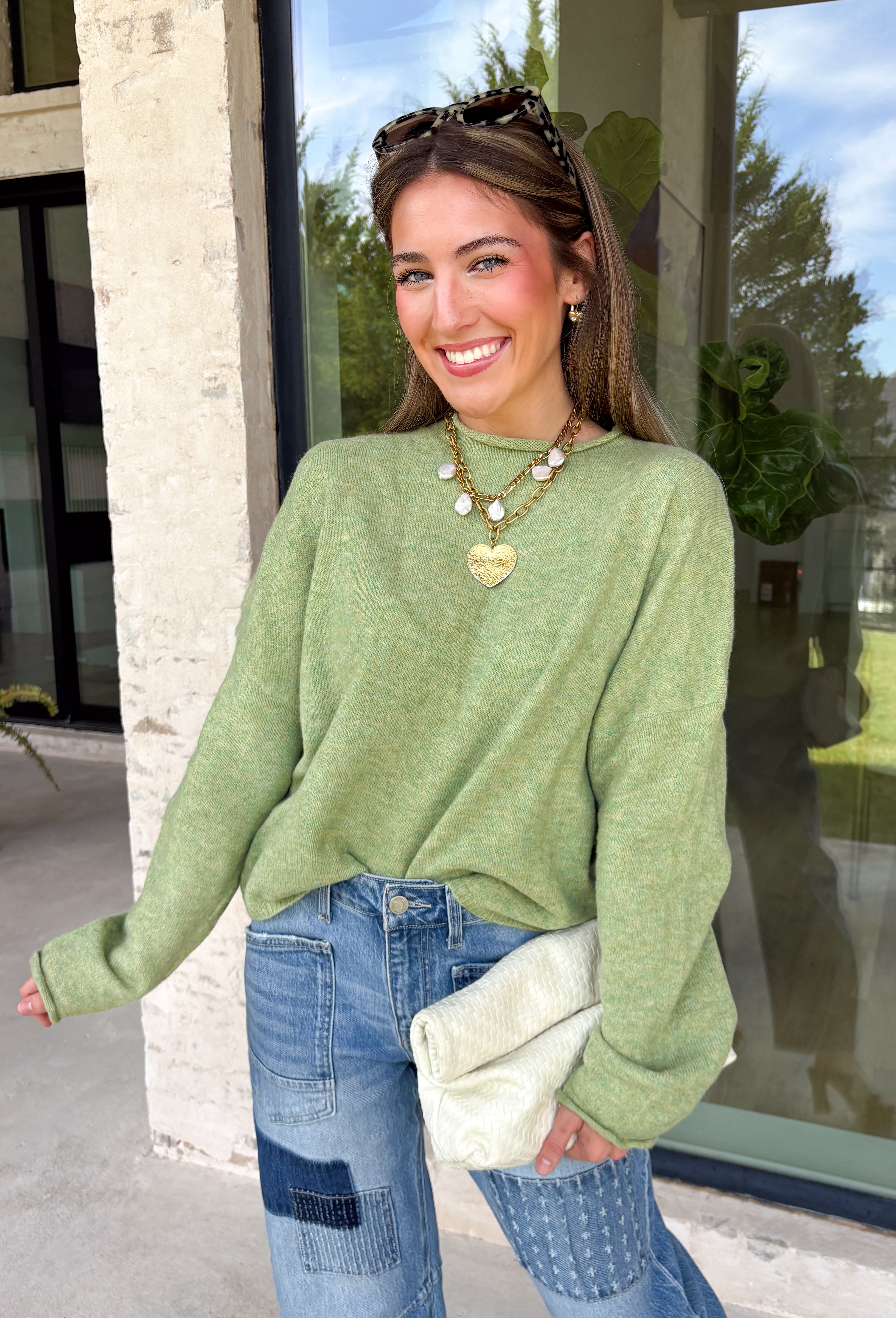 Nothing says cozy season quite like the perfect everyday sweater, and this one from Things Between is sure to become your new favorite. Designed in a matcha hue, this soft knit sweater is effortlessly timeless and easy to style with all your favorite fall pieces. The cozy knit construction offers warmth without feeling bulky, making it perfect for layering on crisp mornings or wearing on its own throughout the season. 