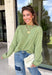 Nothing says cozy season quite like the perfect everyday sweater, and this one from Things Between is sure to become your new favorite. Designed in a matcha hue, this soft knit sweater is effortlessly timeless and easy to style with all your favorite fall pieces. The cozy knit construction offers warmth without feeling bulky, making it perfect for layering on crisp mornings or wearing on its own throughout the season. 